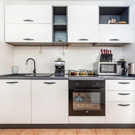 Сasa de vacaciones Cozy In With Kitchen